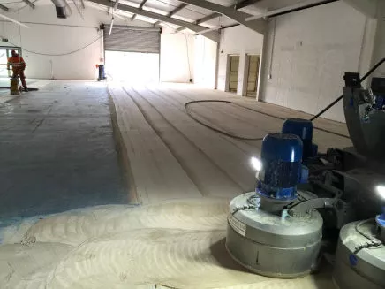 Grinding paint off surface