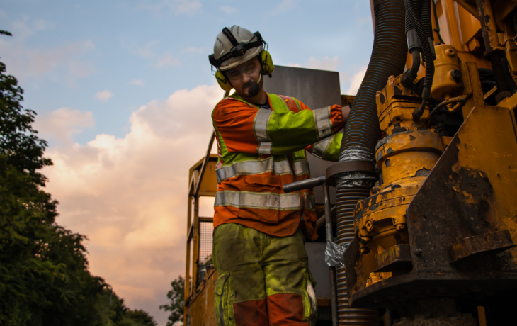 Image of WJ working working on road lining machinery